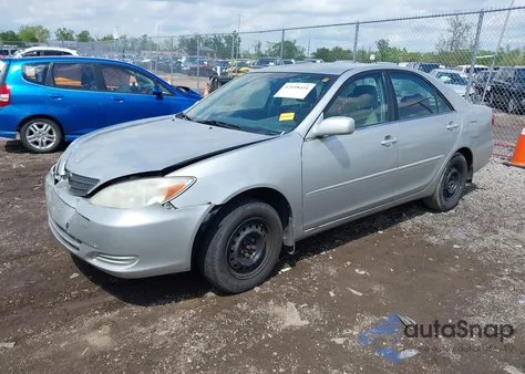 2004 Toyota Camry Le z USA, uszkodzony, nr VIN 4T1BE32K94U834319